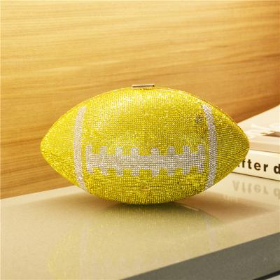 China Diamond Daily Popular Rugby Shaped Unique Crystal Clutch Handbag Shoulder Bag Personality Football Purse Rhinestone Clutch Purse for sale