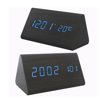 China Modern Multifunctional Electronic Calendars Bedside Clock Triangle Display Table Temperature Led Digital Wooden Alarm Clock for sale