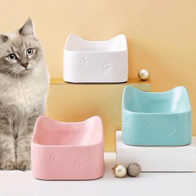 China Paw Printed Elevated Cat Food Sustainable Cat Raised Bowl Ceramic Pet Bowl for sale