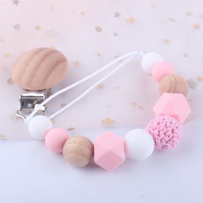 China New Design BPA Food Grade Silicone Baby Free Pacifier Chain Wooden Pacifier Clip for sale