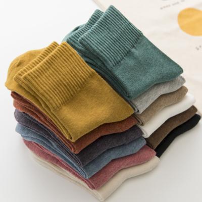 China Sporty Simple Breathable Cotton Sock Women Solid Color Medium Socks for sale