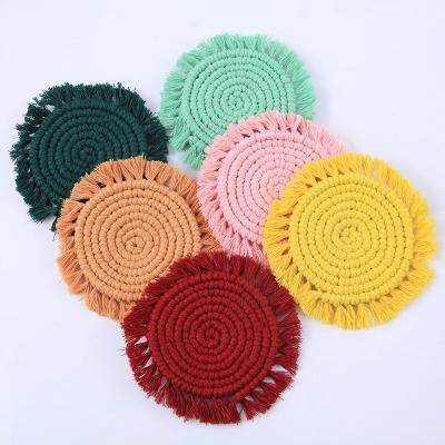 China Sustainable Colorful Handwoven Boho Heat Insulation Coasters Round Tassel Place Mat for sale