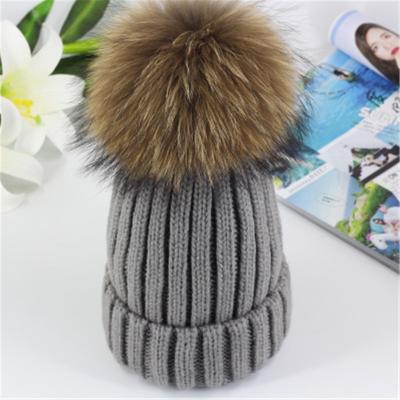 China breathable & Waterproof 2020 winter new ladies raccoon fur ball wool hat parent-child leisure knitted hat thick striped outdoor really big wholesale for sale