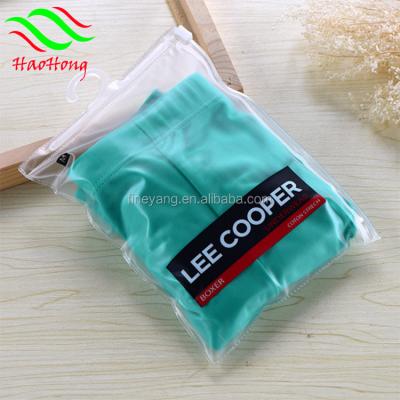 China Customized transparent transparent PVC BIODEGRADABLE package bag with hook hanger for clothing for sale