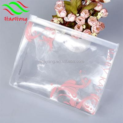 China Wholesale BIODEGRADABLE Clear Soft Vinyl PVC Cosmetic Zipper Pouch/PVC Zipper Pouch Plastic Standing Bag With Tear Notch For Snack for sale