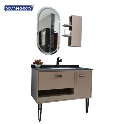 China Modern Solid Wood Bathroom 39 Inch Vanity Cabinet With Metal Fittings And Oval Smart Mirror for sale