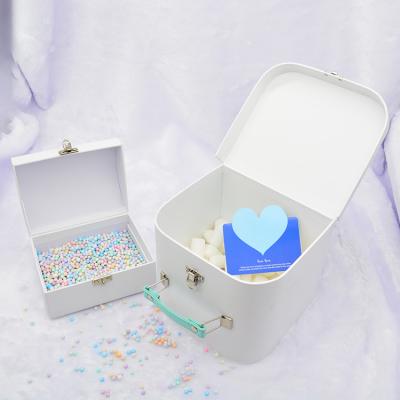 China Custom Recycled Materials Cardboard Apparel Packaging Clamshell Portable Suitcase Shaped Luxury Gift Box Cosmetics Storage Box for sale