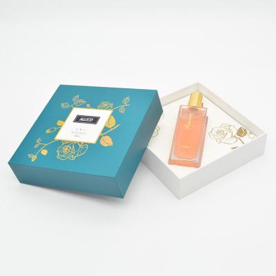 China Handmade Custom Logo Luxury Perfume Package Lid and Low Boxes Cardboard Packaging Box with Foam Insert for sale