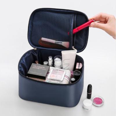 China Multifunctional Travel Men's Wash Eco-friendly Bag Can Be Hung Oxford Cloth Storage Makeup Bag Custom Cosmetic Bag For Women for sale