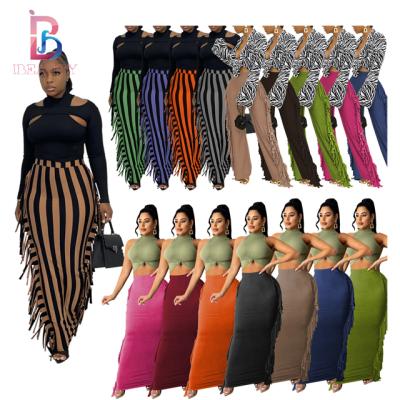 China Ibeauty breathable 2022 high quality women's skirts long with tassel plus size women's skirts solid women's skirts for sale