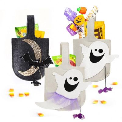 China Felt Cloth Wholesale Halloween Cute Ghost Decoration Praying For Sugar Bags Halloween Candy Bag for sale