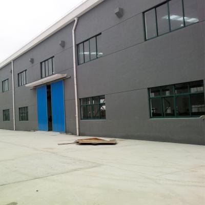 China Prefabricated Metal Building Construction Q355b Q235b Steel Frame Contruction Buildings for sale