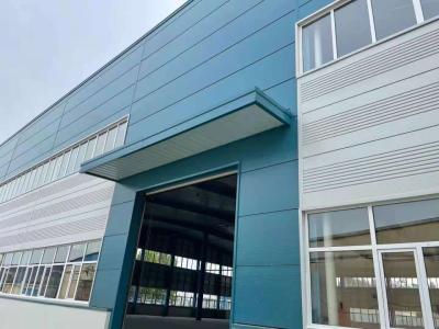 China Prefabricated Steel Frame Workshop Kit Galvanized Prefab Metal Garage Buildings for sale