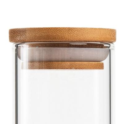 China High quality stocked borosilicate glass jar with different sizes and lids for honey for sale