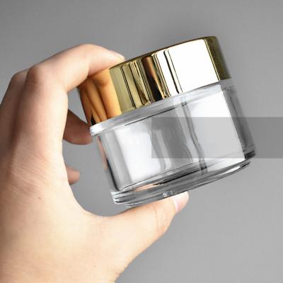 China Personal Care Product Container 50g 100g Jar Glass Jars Clear Glass Cosmetic Cream Jar 30ml 50ml 100ml For Lip Balm Empty for sale