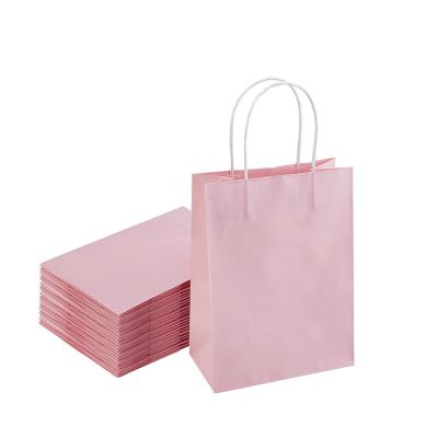 China Handmade Wholesale Light Pink Advertising Gift Bag Clothing Packaging Paper Bag Green Shopping Handbag Supermarket Shopping 10 Pieces for sale