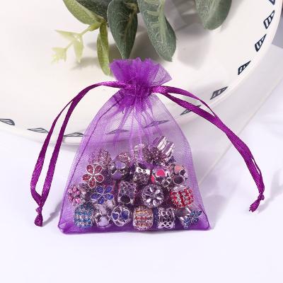 China Sheer Jewelry Pouch Organza Gift Bags Mesh Jewelry Pouches With Drawstring Wedding Party Favors Packaging Pouch Small Customized Logo for sale