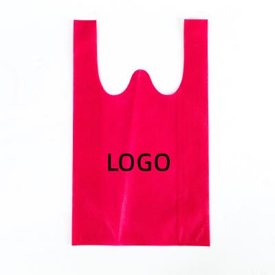 China Eco Reusable Non Woven Shopping Vest Bags T-Shirt Carry Out Bags Supermarket Grocery Bags With Handles Customized Logo Printing for sale