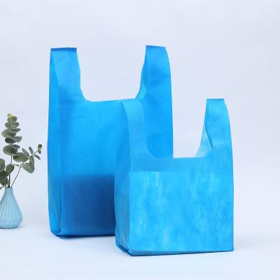 China Reusable and Disposable Reusable Multi Colors T-Shirt Shopping Vest Supermarket Nonwoven Grocery Bag Bags with Handles Custom Logo for sale