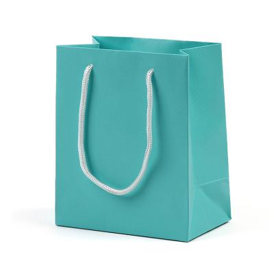 China Recyclable Custom Shopping Paper Bags With Ribbon Handle for sale