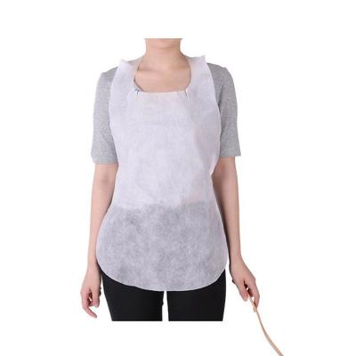 Κίνα OEM Cheap Wholesale Disposable Sleeveless Aprons Paper Waterproof Nonwoven Fabric Apron προς πώληση