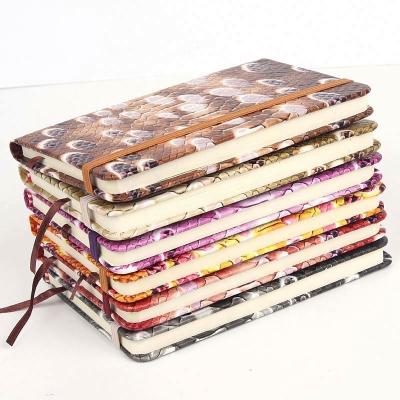 China Promotional Fashionable Style Printed Multi Color Dairy Notebook Cardboard Notebook for sale