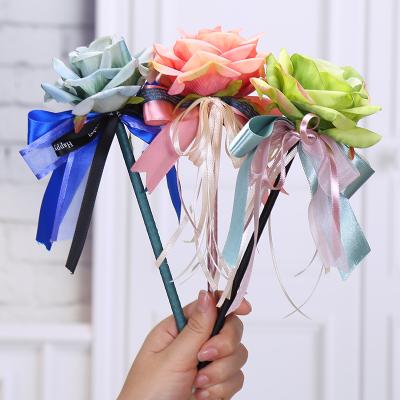 China Popular Creative Advertising Pen Bow Ribbon Pen Custom Logo Simulation Rose Flower Ballpoint Wedding Gift Pen for sale