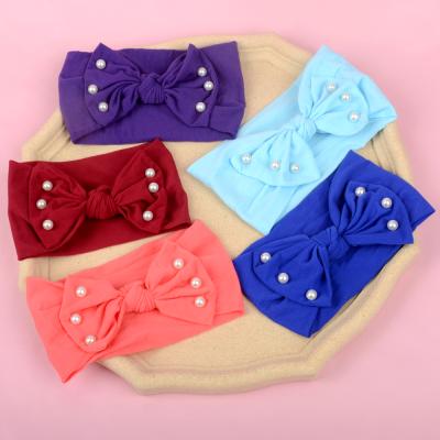 China Baby Stretch Hairband Color Soild Elastic Headband Beads Bows Knot Soft Stretch Nylon Headbands For Girls Hair Accessories for sale