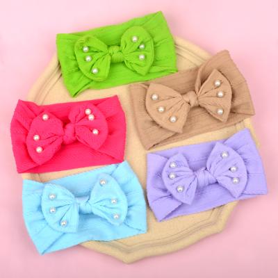 China Hair Decoration Fit All Baby Hair Accessories Bow Big Soft Elastic Pearl Colors Nylon Baby Headbands Hairbands Baby Headbands For Girls Children for sale