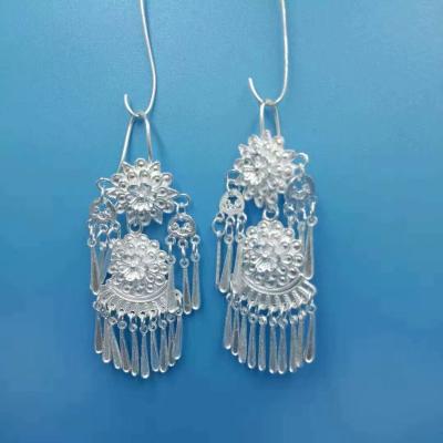 China Lunaric Cute Miao Hmong 990 Pure Silver Earrings 14g Pure Silver Pure Handmade Women's Jewelry Earrings for sale