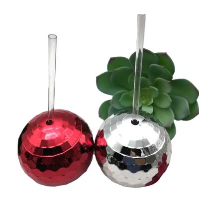 China Stocked Ready To Ship Sliver Color Ball Plastic Drink Tumbler Round Shaped Plastic Tumbler With Straw for sale