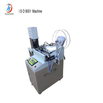 China Ultrasonic Woven Satin Garment Ribbon Video Apparel Exposure ISO9001 Label Cut And Fold Machine for sale