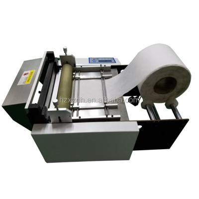 China HZX-300A Automatic Adhesive Tape Cutting Machine for Metallic Foil and Non Woven Fabric for sale