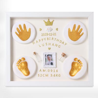 China Modern simplicity newborn baby memories hand and foot pad photo frame first year handprint and footprint photo frame for sale