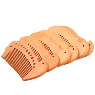 China Home wholesale wooden comb for baby wooden fish comb wooden comb with logo for sale