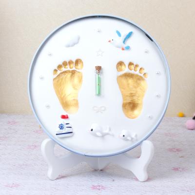 China Modern Simplicity Baby Keepsake Hand and Foot Pad Photo Frame Handprint and Footprint Photo Frame with Iron Box for sale