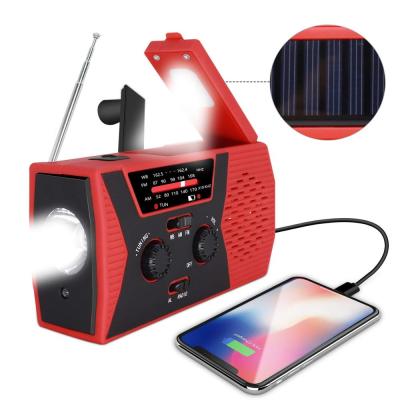 China PORTABLE AM/FM/NOAA 2000mAh Handheld Radio with LED Light SOS Alarm Solar Power Panel Hand Crank USB Charging 18650 Lithium Rechargeable for sale