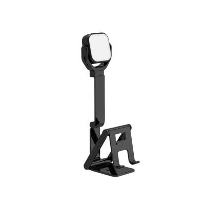 China Desktop Adjustable Portable Metal Mini Smartphone Stand Foldable Mobile Phone Stand with Fill Light for YouTube Livestream for sale