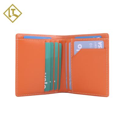 China Fashion Smooth Genuine Leather Thin Minimalist Grain RFID Full Blocking Front Pocket Credit Card Holder Wallet For Men for sale