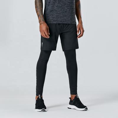 China Breathable Compression Pants Men Gym Running Pants for sale