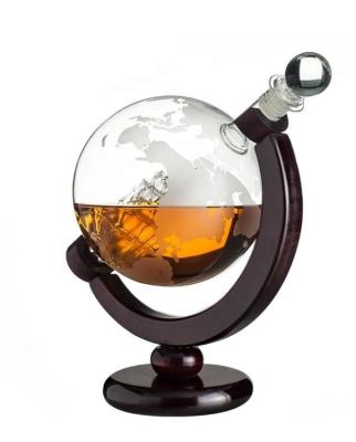 China Sustainable Customized Logo Ship Decanter Glass Wine Bottle And Package With Globe Map for sale