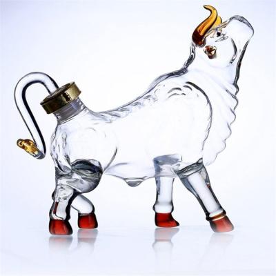 China Beverage 1000ml 750ml Bottle Cow Shape Liquor Bottle Glass Bull Handmade Animal Bottle For Spirits for sale