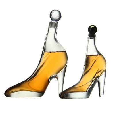 China Wine 500 750ml High Heel Shoes Decorated Whiskey Cups Glass Bottles for sale