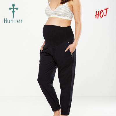 China Antibacterial Wholesale Pregnant Woman Ladies Fitness Pants Breathable Yoga Maternity Wear for sale