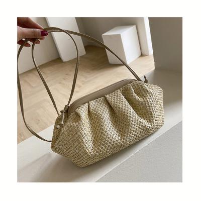 China Fashion Straw Cloud Staple Mouth Pastoral Woven Clutch Bag 2021 Summer Travel Shoulder Messenger Purses For Women Handbags for sale