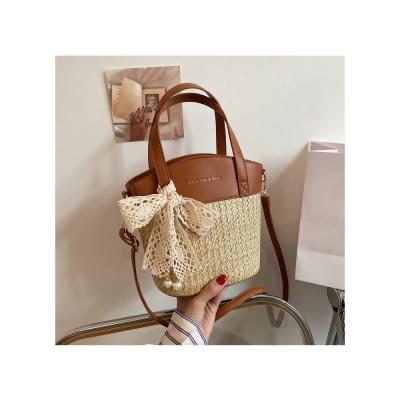 China 2021 Summer Fashion Girl Insti Profit Bucket Handheld Purse Handmade Straw Woven Beach Bag For Women Korean Handbag for sale