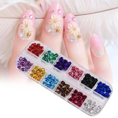 China Nail art 1 box 3D metal flower nail art decoration faux stone for 2021 nail accessories decorations for sale