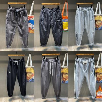 China Anti-wrinkle summer slim casual pants men's loose ice silk sports pants quick-drying pants men's pants for sale