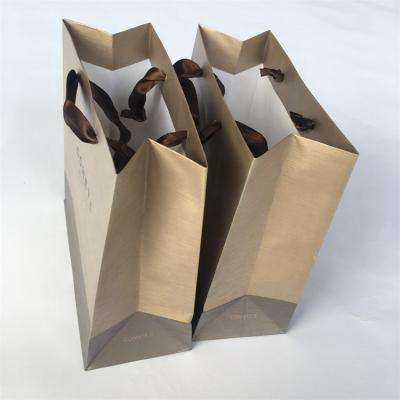 China Recyclable Customized Logo Wrapping Dubai Chocolate Gift Bag Printed Brown Kraft Paper Shopping Bag for sale