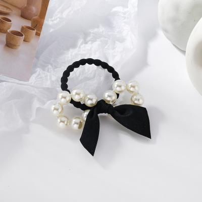 China Ring Korea Simple Sweet Hair Hair Bow Cloth Pearl Link Female Head Net Red Elegant Elastic Rope Hair Accessories Temperament for sale